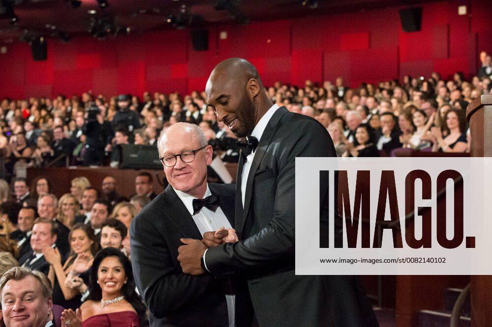 Glen Keane and Kobe Bryant celebrate winning the Oscar for best animated short film, for work on Dear Basketball during the live ABC Telecast of The 90th Oscars® at the Dolby® Theatre in Hollywood, CA on Sunday