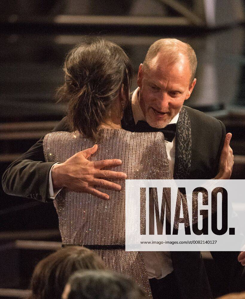 Oscar nominees Woody Harrelson and Sally Hawkins embrace at The 90th Oscars® at the Dolby® Theatre in Hollywood, CA on Sunday