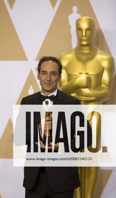 Composer Alexandre Desplat winner of the Best Original Music Score for Shape of Water poses in the press room during the 90th annual Academy Awards ceremony at the Dolby Theatre in Hollywood, California, on 4 March 2018. The Oscars are presented for outstanding individual or collective efforts in 24 categories in filmmaking. 90th annual Academy Awards ceremony !ACHTUNG: NUR REDAKTIONELLE NUTZUNG!