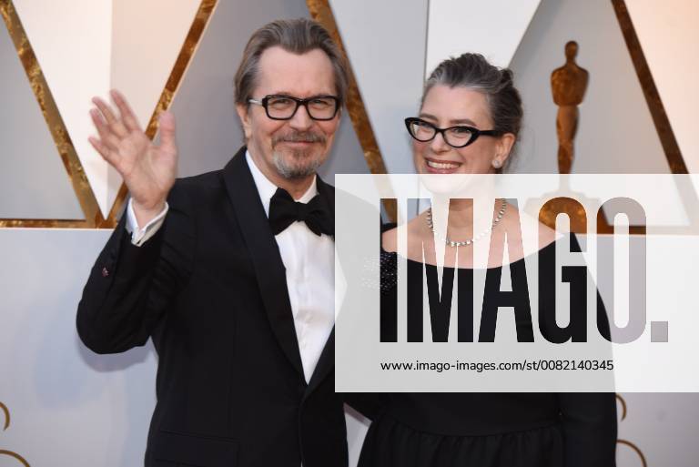 Los Angeles, California, U.S. - GARY OLDMAN and his wife GISELE SCHMIDT arrives on the red carpet for the 90th Annual Academy Awards at the Dolby Theatre. Los Angeles U.S. - ZUMAz03_ 20180304_zbp_z03_166