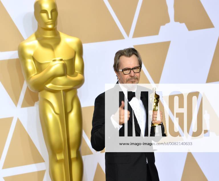 Actor Gary Oldman, winner of the award for Best Actor award for Darkest Hour, appears backstage with his Oscar during the 90th annual Academy Awards at Loews Hollywood Hotel in the Hollywood section of Los Angeles on March 4, 2018. LAP201803041136 JIMxRUYMEN