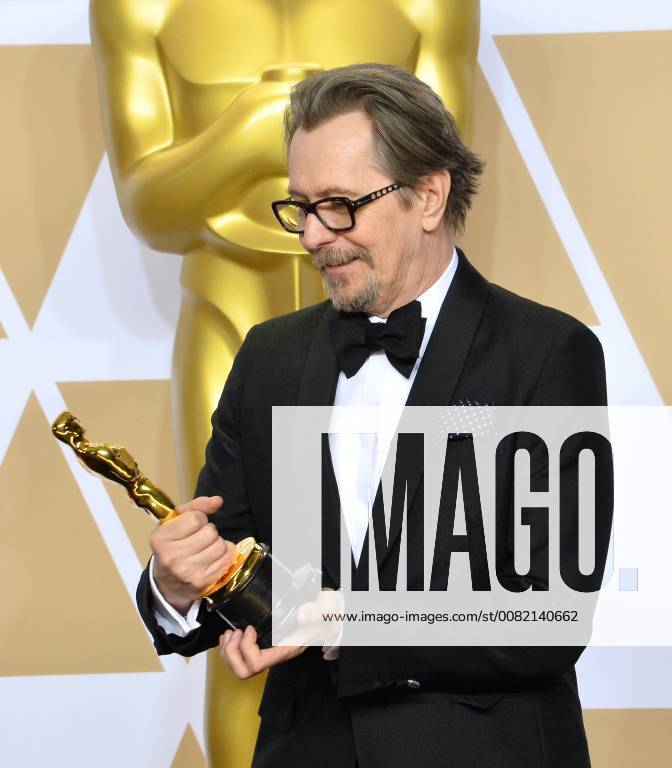 Actor Gary Oldman, winner of the award for Best Actor award for Darkest Hour, appears backstage with his Oscar during the 90th annual Academy Awards at Loews Hollywood Hotel in the Hollywood section of Los Angeles on March 4, 2018. LAP201803041130 JIMxRUYMEN