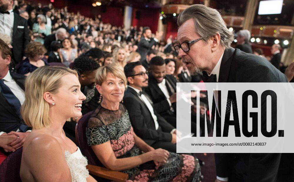 Oscar nominees Margot Robbie and Gary Oldman greet each other during the live ABC Telecast of the 90th OscarsÂ® at the DolbyÂ® Theatre in Hollywood, CA on Sunday