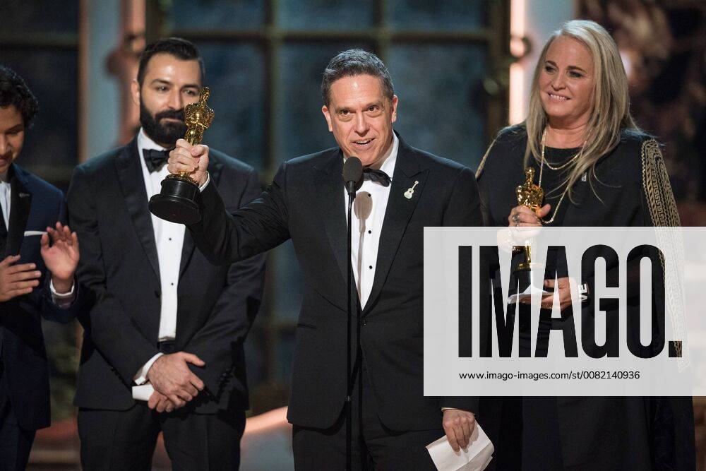Adrian Molina, Lee Unkrich and Darla K. Anderson accept the Oscar for best animated feature film of the year for work on Coco during the live ABC Telecast of The 90th OscarsÂ® at the DolbyÂ® Theatre in Hollywood, CA on Sunday
