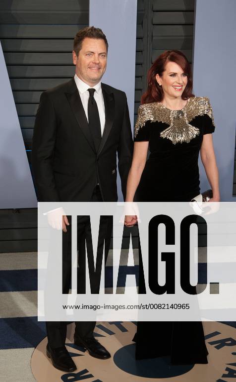 Beverly Hills, California, U.S - Actor Nick Offerman (L) and actress Megan Mullally on the red carpet of the 2018 Vanity Fair Oscar Party held at the Wallis Annenberg Center in Beverly Hills, California on Sunday March 4, 2018. Beverly Hills U.S. - ZUMAp124 20180304_zaa_p124_185