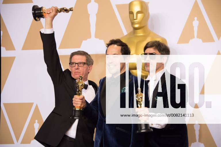 Mar 4, 2018 - Hollywood, California, U.S. - Jeffrey A. Melvin, PAUL DENHAM AUSTERBERRY and Shane Vieau pose backstage with the Oscar for Achievement in production design, for work on The Shape of Water during the live ABC Telecast of The 90th Oscars at the Dolby Theatre in Hollywood. Hollywood U.S. - ZUMAz03_ 20180304_shf_z03_640