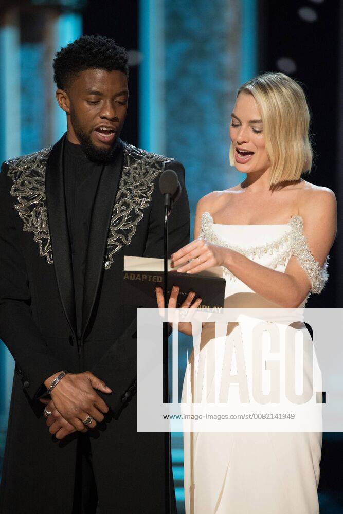 Chadwick Boseman and Margot Robbie present the Oscar for best adapted screenplay during the live ABC Telecast of The 90th Oscars® at the Dolby® Theatre in Hollywood, CA on Sunday