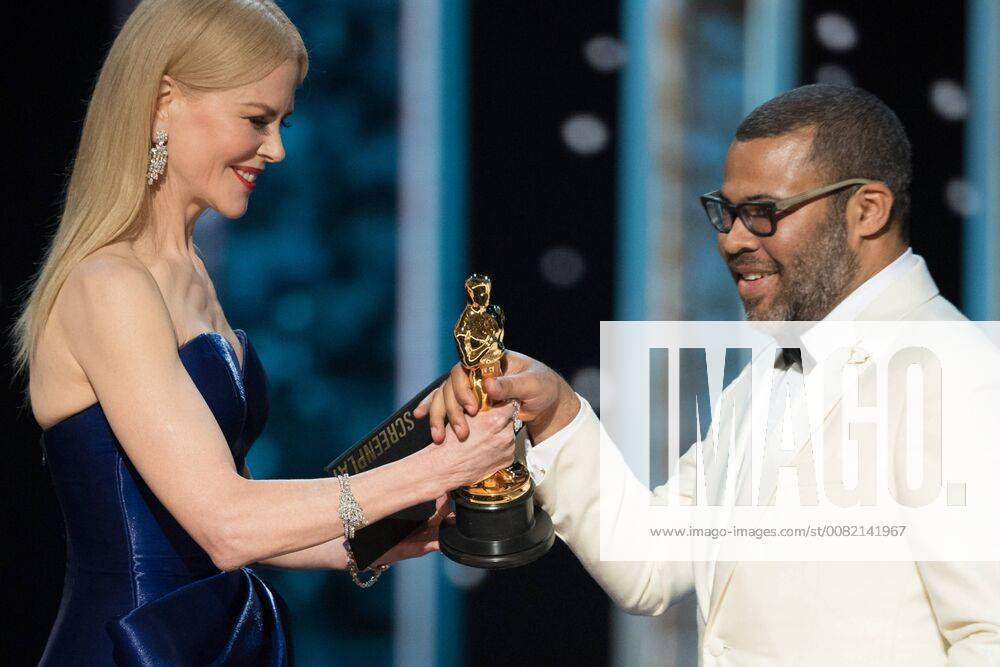 Nicole Kidman presents the Oscar for Best Original Screenplay to Jordan Peele for work on Get Out during the live ABC Telecast of The 90th Oscars® at the Dolby® Theatre in Hollywood, CA on Sunday