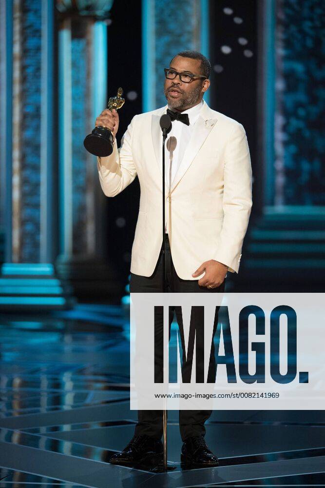 Jordan Peele accepts the Oscar for original screenplay for work on Get Out during the live ABC Telecast of The 90th Oscars® at the Dolby® Theatre in Hollywood, CA on Sunday
