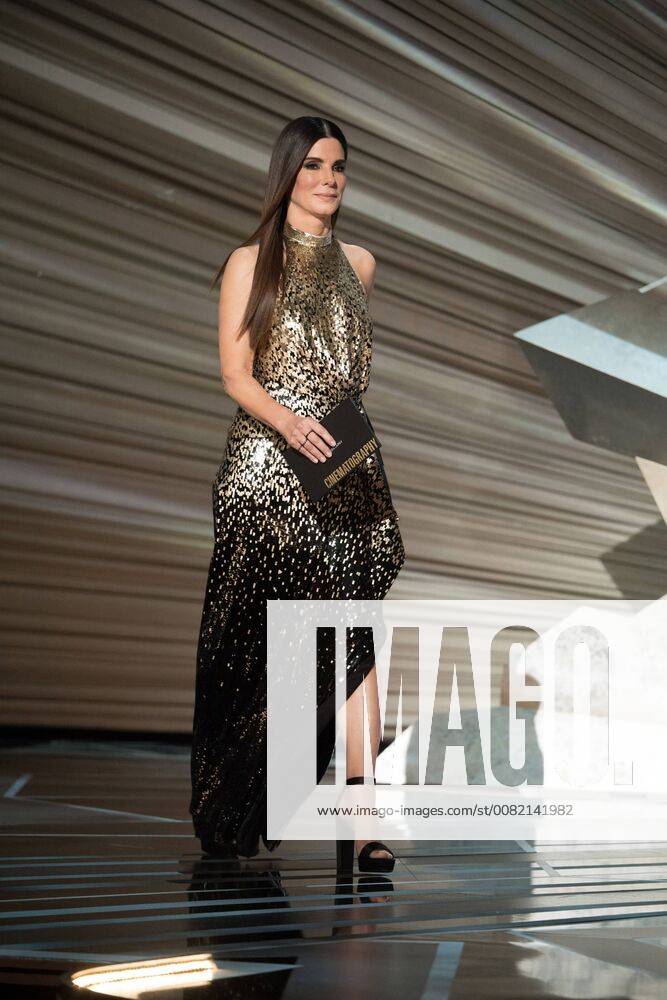 Sandra Bullock presents the Oscar for achievement in cinematography during the live ABC Telecast of The 90th Oscars® at the Dolby® Theatre in Hollywood, CA on Sunday