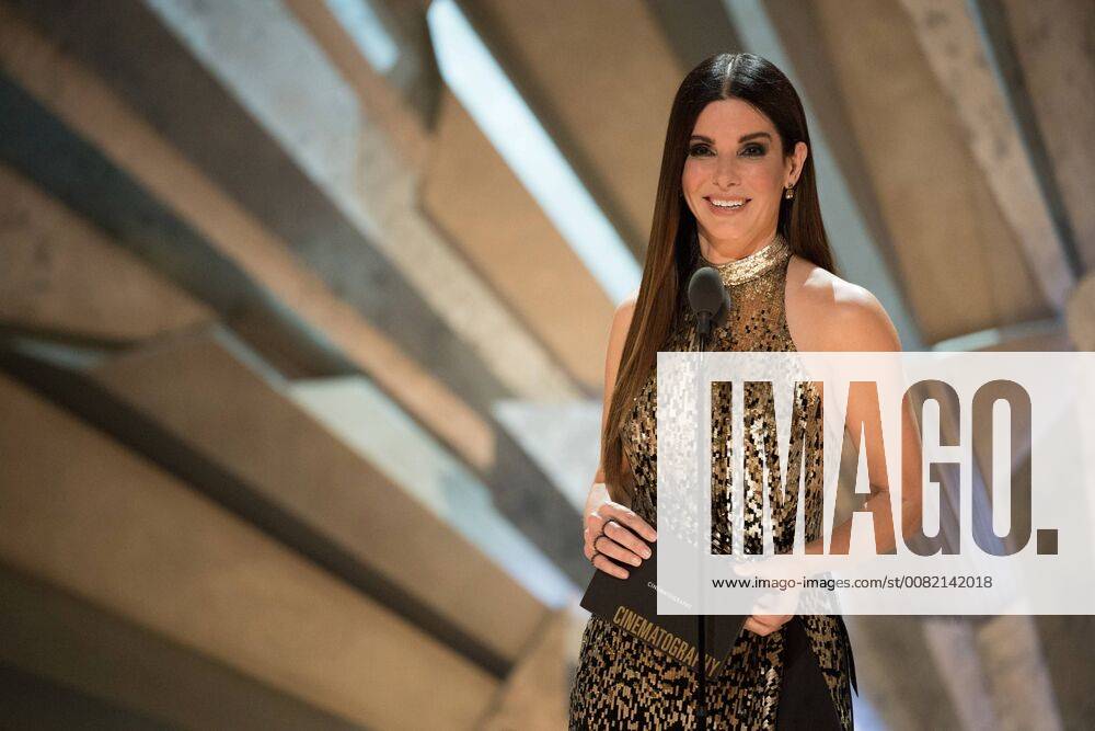 Sandra Bullock presents the Oscar for achievement in cinematography during the live ABC Telecast of the 90th Oscars® at the Dolby® Theatre in Hollywood, CA on Sunday