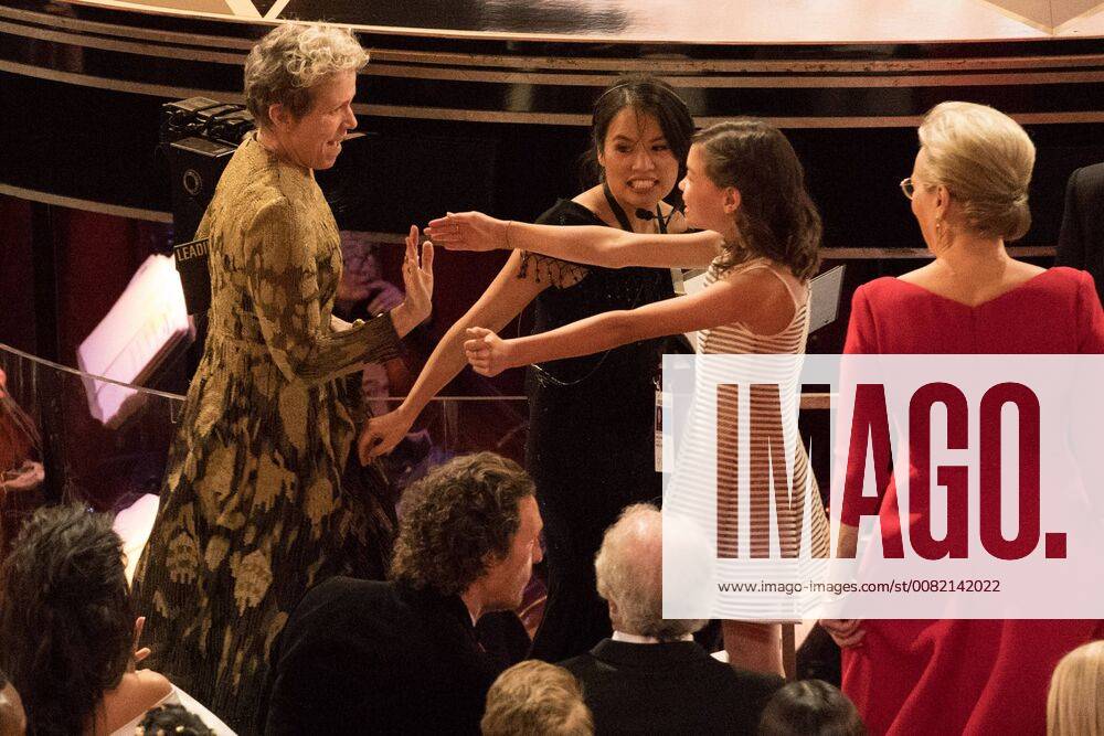 Frances McDormand, Oscar winner for her performance by an actress in a leading role for work on Three Billboards Outside Ebbing, Missouri, hugs guests during the live ABC Telecast of The 90th Oscars® at the Dolby® Theatre in Hollywood, CA on Sunday