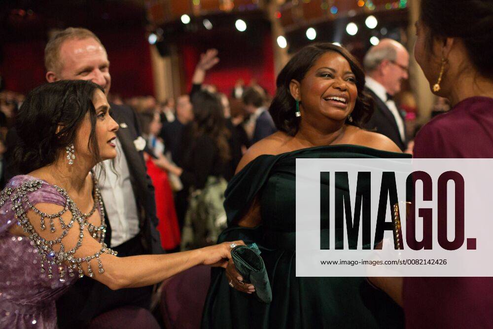 Salma Hayek talks with Oscar-nominee Octavia Spencer during the live ABC Telecast of the 90th Oscars® at the Dolby® Theatre in Hollywood, CA on Sunday