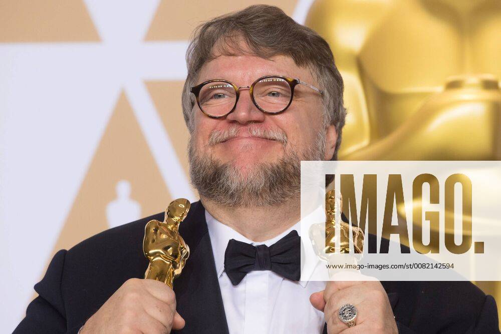 Guillermo del Toro pose backstage with the Oscar for best motion picture for work on The Shape of Water during the live ABC Telecast of The 90th Oscars® at the Dolby® Theatre in Hollywood, CA on Sunday