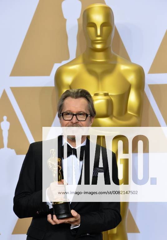 Actor Gary Oldman, winner of the award for Best Actor award for Darkest Hour appears backstage with his Oscar during the 90th annual Academy Awards at Loews Hollywood Hotel in the Hollywood section of Los Angeles on March 4, 2018. LAP201803041536 JIMxRUYMEN