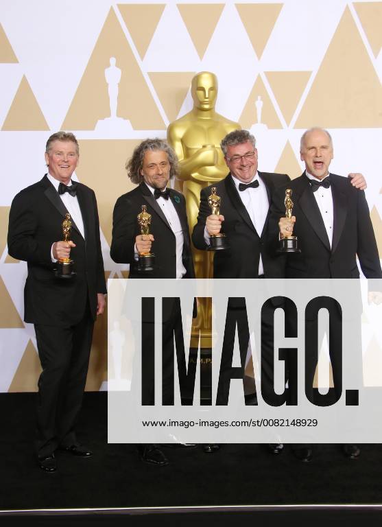 HOLLYWOOD, CA - MARCH 4: Richard R. Hoover, Paul Lambert, Gerd Nefzer, John Nelson, in the press room at the 90th Academy Awards at the Dolby Theatre in Hollywood, California on March 4, 2018.