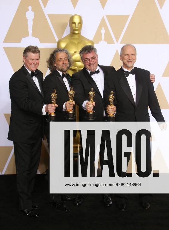 HOLLYWOOD, CA - MARCH 4: Richard R. Hoover, Paul Lambert, Gerd Nefzer, John Nelson, in the press room at the 90th Academy Awards at the Dolby Theatre in Hollywood, California on March 4, 2018.