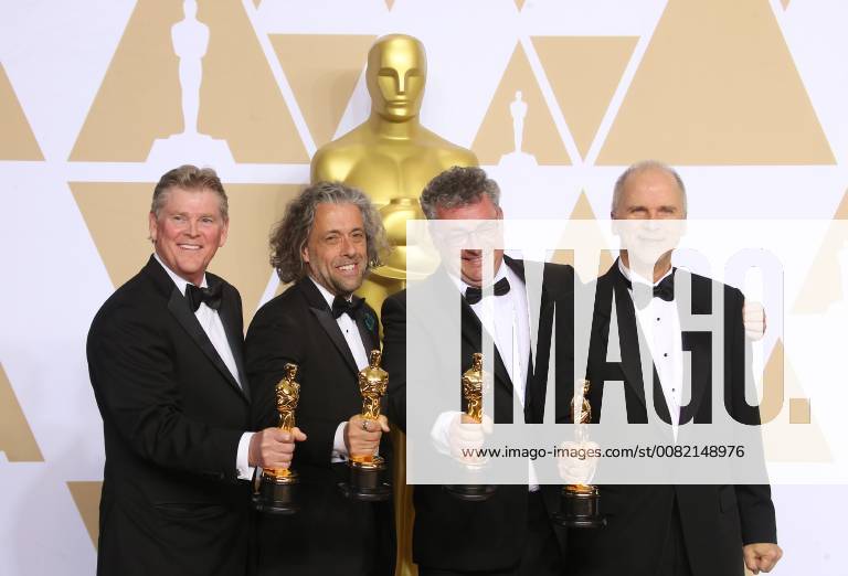 HOLLYWOOD, CA - MARCH 4: Richard R. Hoover, Paul Lambert, Gerd Nefzer, John Nelson, in the press room at the 90th Academy Awards at the Dolby Theatre in Hollywood, California on March 4, 2018.