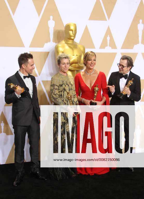HOLLYWOOD, CA - MARCH 4: Sam Rockwell, Frances McDormand, Allison Janney, Gary Oldman, in the press room at the 90th Academy Awards at the Dolby Theatre in Hollywood, California on March 4, 2018.