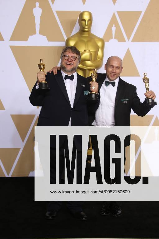 HOLLYWOOD, CA - MARCH 4: Guillermo del Toro, J. Miles Dale, in the press room at the 90th Academy Awards at the Dolby Theatre in Hollywood, California on March 4, 2018.