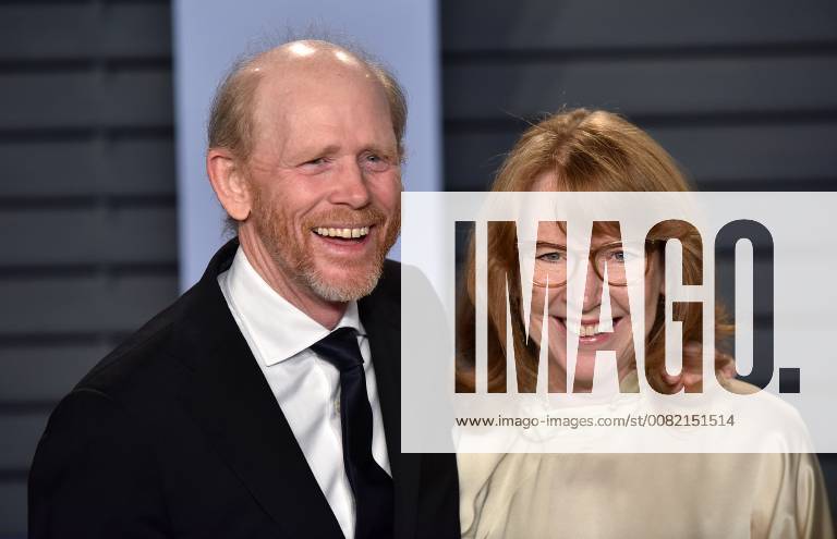 Ron Howard (L) and his wife Cheryl Howard arrive for the Vanity Fair Oscar Party at the Wallis Annenberg Center for the Performing Arts in Beverly Hills, California on March 4, 2018. LAP201803043036 CHRISTINExCHEW