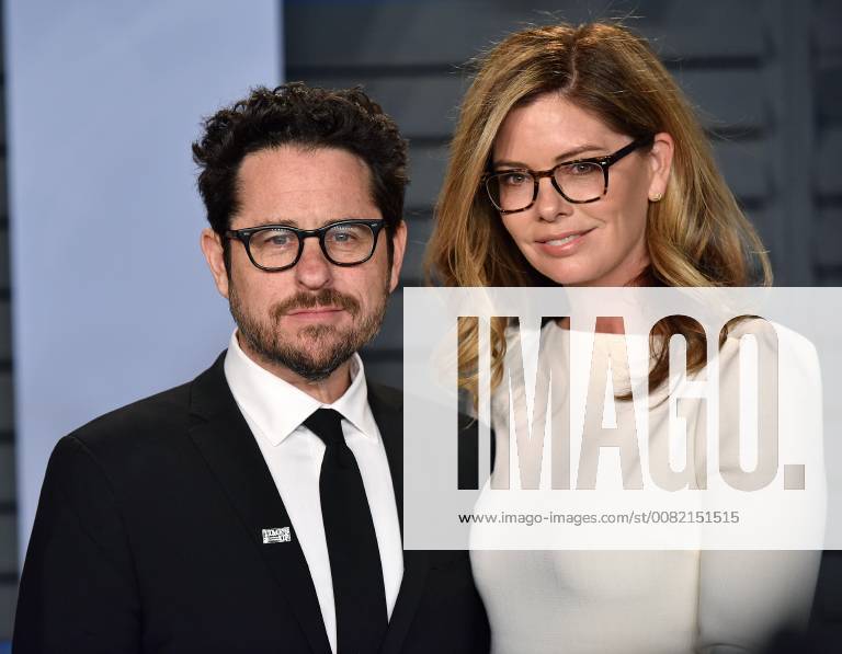 J.J. Abrams (L) and his wife Katie McGrath arrive for the Vanity Fair Oscar Party at the Wallis Annenberg Center for the Performing Arts in Beverly Hills, California on March 4, 2018. LAP201803043039 CHRISTINExCHEW