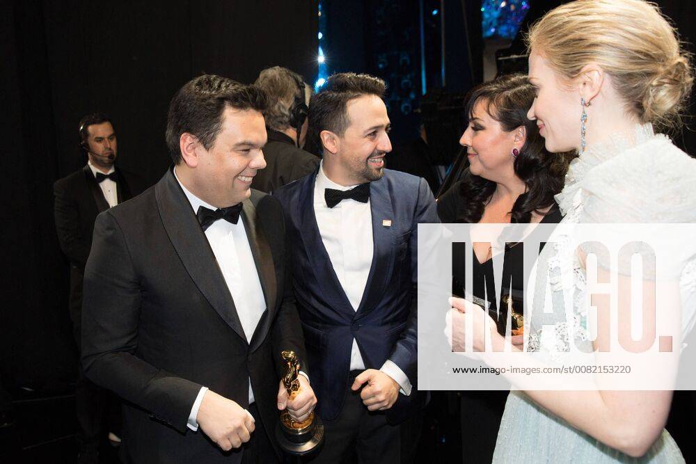 After winning the Oscar for music written for motion pictures (original song) for Remember Me from Coco, Kristen Anderson-Lopez and Robert Lopez chat backstage with Lin-Manuel Miranda and Emily Blunt during the live ABC Telecast of The 90th Oscars® at the Dolby® Theatre in Hollywood, CA on Sunday