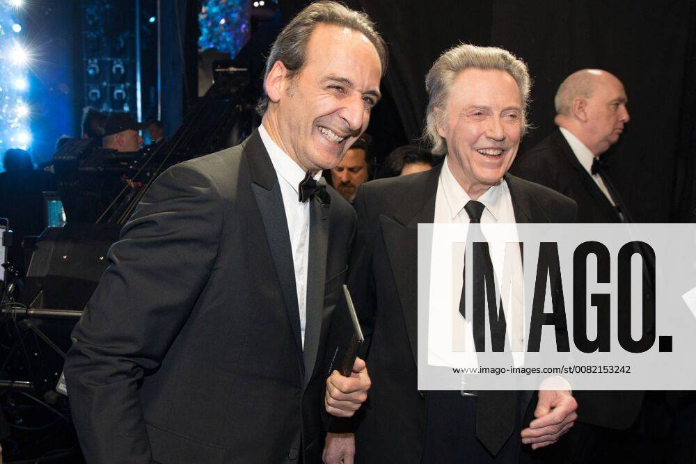 Christopher Walken with Alexandre Desplat as he poses backstage with the Oscar for achievement in music written for motion pictures (original score) for work on The Shape of Water during the live ABC Telecast of The 90th OscarsÂ® at the DolbyÂ® Theatre in Hollywood, CA on Sunday