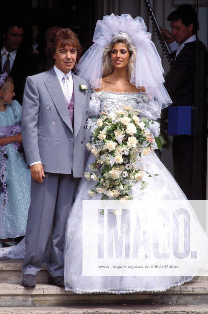 Bill Wyman & Mandy Smith s wedding BILL WYMAN ( THE ROLLING STONES ) & MANDY SMITH s Wedding Ref: 026 wedding dress, eighties fashion, bouquet, flowers London Great Britain