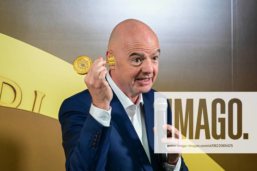 FIFA President Gianni Infantino, speaks next to the Club World Cup trophy during an event in Miami, Florida, 10 June 2025. Infantino assured that the reduction in ticket prices for Club World Cup matches, 84% for the opening match, is part of the ticket sales model in the United States and is not a sign of concern. FIFA downplays the impact of USA immigration policy on sports tournaments !ACHTUNG: NUR REDAKTIONELLE NUTZUNG!
