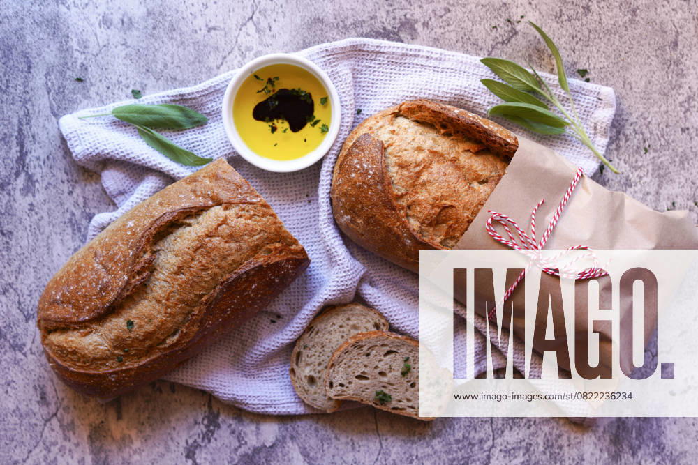 Stone Baked Light Rye Sourdough Bread Served with Olive Oil and Balsamic Vinegar. Stone Baked Light Rye Sourdough Bread Served with Olive Oil and Balsamic Vinegar.