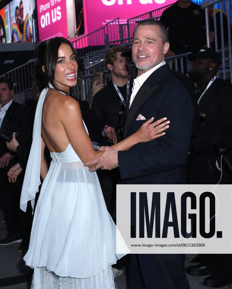 Ines de Ramon and Brad Pitt attend the World Premiere of Apple Original Films F1: The Movie at Times Square in New York. June 16, 2025. New York United States - ZUMAp281 20250616_zea_p281_045