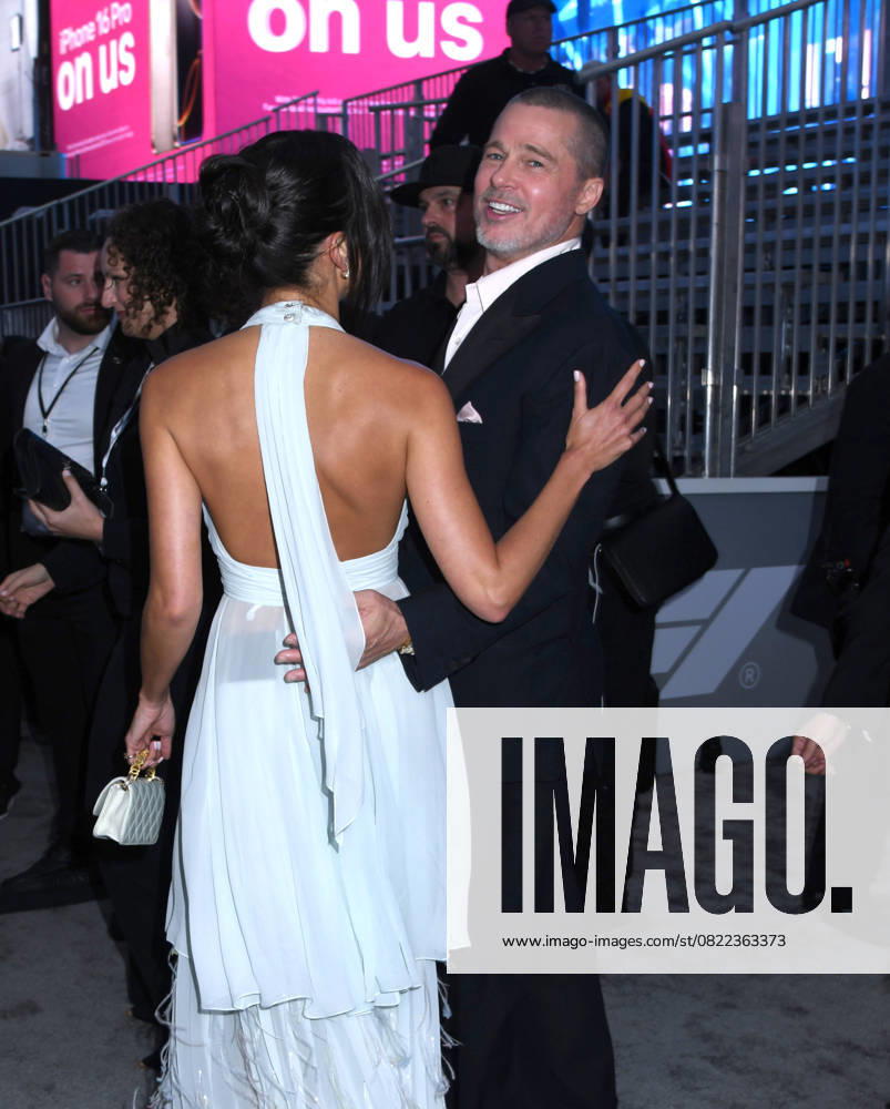 Ines de Ramon and Brad Pitt attend the World Premiere of Apple Original Films F1: The Movie at Times Square in New York. June 16, 2025. New York United States - ZUMAp281 20250616_zea_p281_046