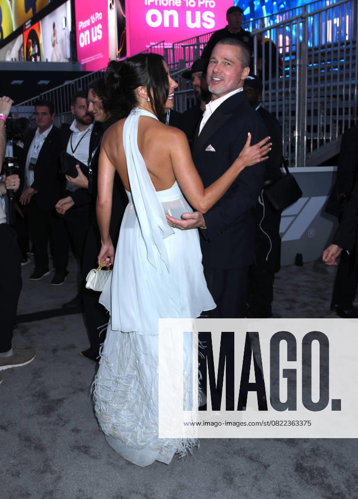 Ines de Ramon and Brad Pitt attend the World Premiere of Apple Original Films F1: The Movie at Times Square in New York. June 16, 2025. New York United States - ZUMAp281 20250616_zea_p281_047
