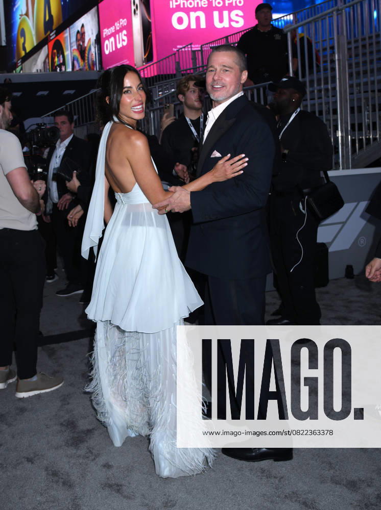 Ines de Ramon and Brad Pitt attend the World Premiere of Apple Original Films F1: The Movie at Times Square in New York. June 16, 2025. New York United States - ZUMAp281 20250616_zea_p281_048