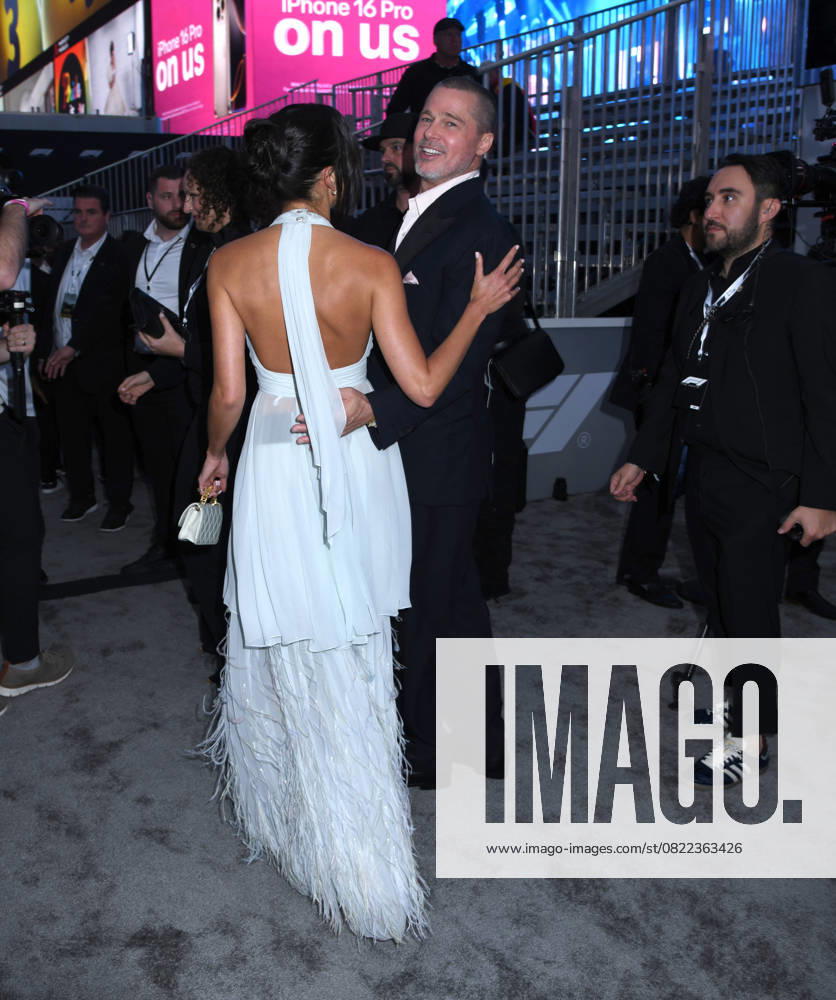 Ines de Ramon and Brad Pitt attend the World Premiere of Apple Original Films F1: The Movie at Times Square in New York. June 16, 2025. New York United States - ZUMAp281 20250616_zea_p281_051