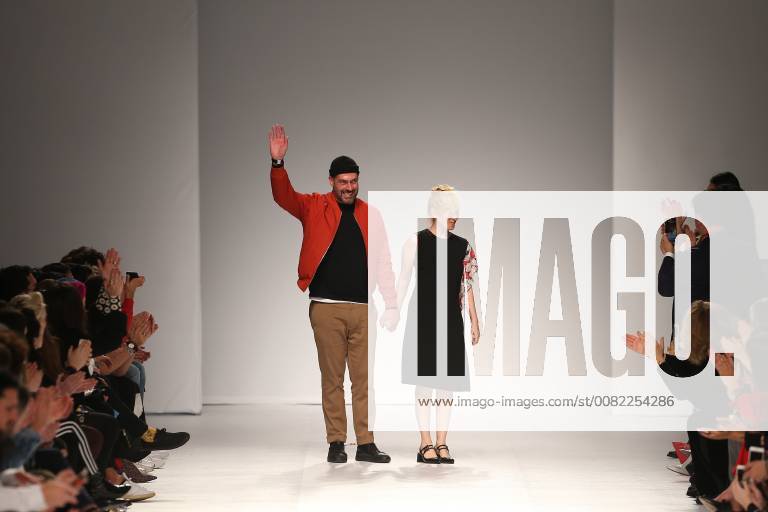 Lisbon, Lisbon, Portugal - Portuguese fashion designer Ricardo Preto (L) acknowledges cheers after presenting the Fall Winter 2018 - 2019 collection runway show at the 50 edition of Lisboa Fashion Week ModaLisboa FW 2018 at Pavilhao Carlos Lopes, on March 10, 2018 in Lisbon, Portugal. Lisbon Portugal - ZUMAn230 20180310_zaa_n230_825