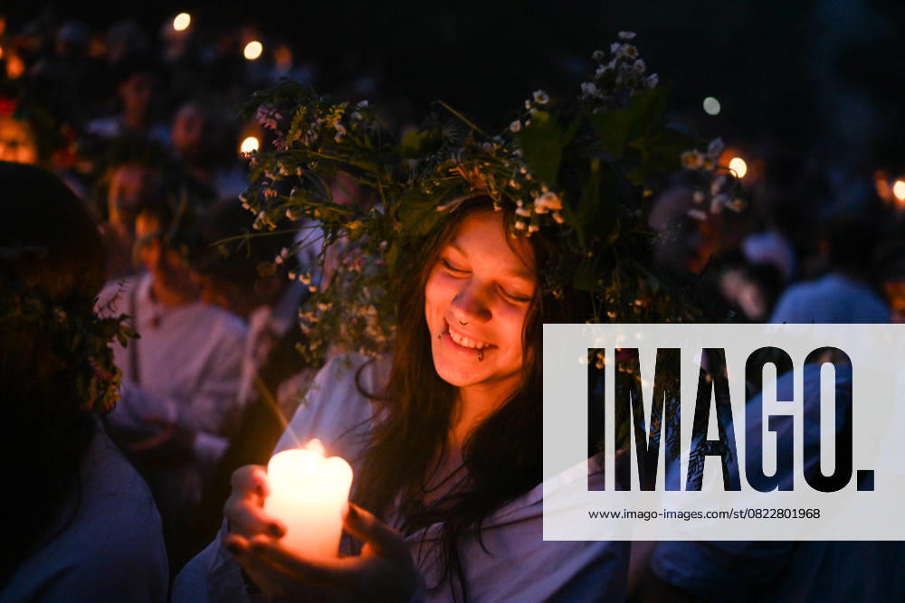 Summer Solstice celebrations in Krakow KRAKOW, POLAND - JUNE 21: People wear flower crowns and hold candles around a bonfire during a Summer Solstice celebration in Krakow, Poland on June 21, 2025. The summer Solstice represents the longest day of the year and it is celebrated around the world. Omar Marques Anadolu Krakow Poland. Editorial use only. Please get in touch for any other usage.