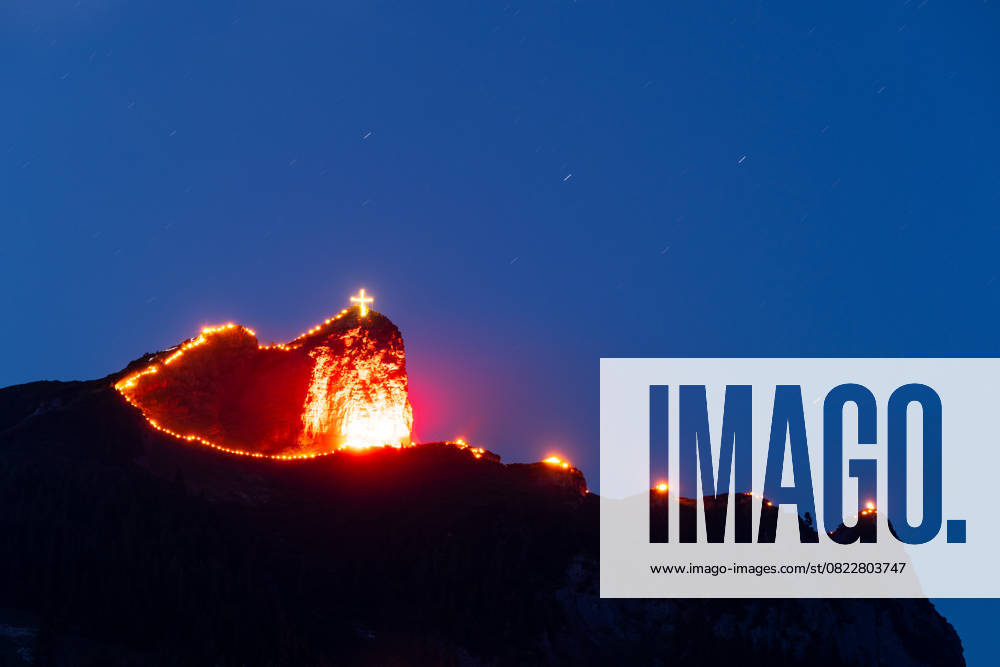 Solstice bonfires at Lake Achensee Mountain bonfires at the summer solstice can be seen on the peaks of the Alps at Lake Achensee , Maurach Tirol Austria