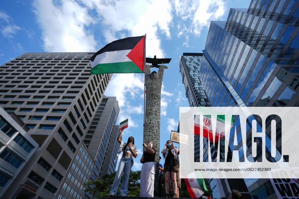 Hands off Iran protest in Toronto TORONTO, CANADA - JUNE 22 : People holding placards and waving Palestinian and Iranian flags gather to protest ongoing attacks on Iran and Gaza, in Toronto, Ontario, Canada on June 22, 2025. Mert Alper Dervis Anadolu Ontario Canada. Editorial use only. Please get in touch for any other usage.