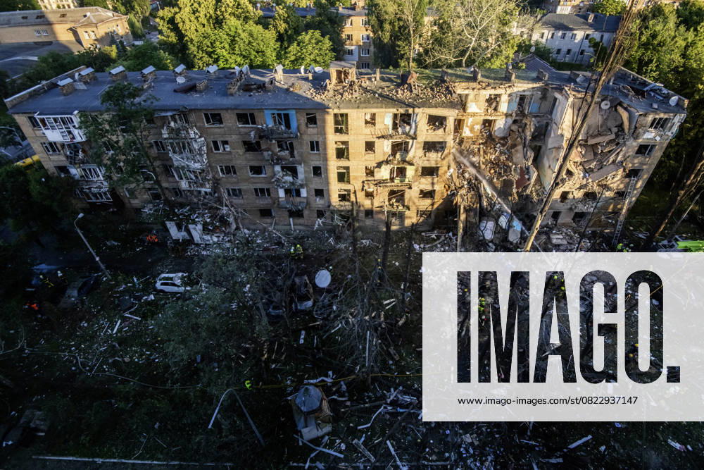 Rescuers Work At The Site Of A Russian Missile Strike On A Residential Building In Kyiv Rescuers work at the site of a Russian missile strike on a residential building during a massive attack in Kyiv, Ukraine, on June 23, 2025. Kyiv Ukraine