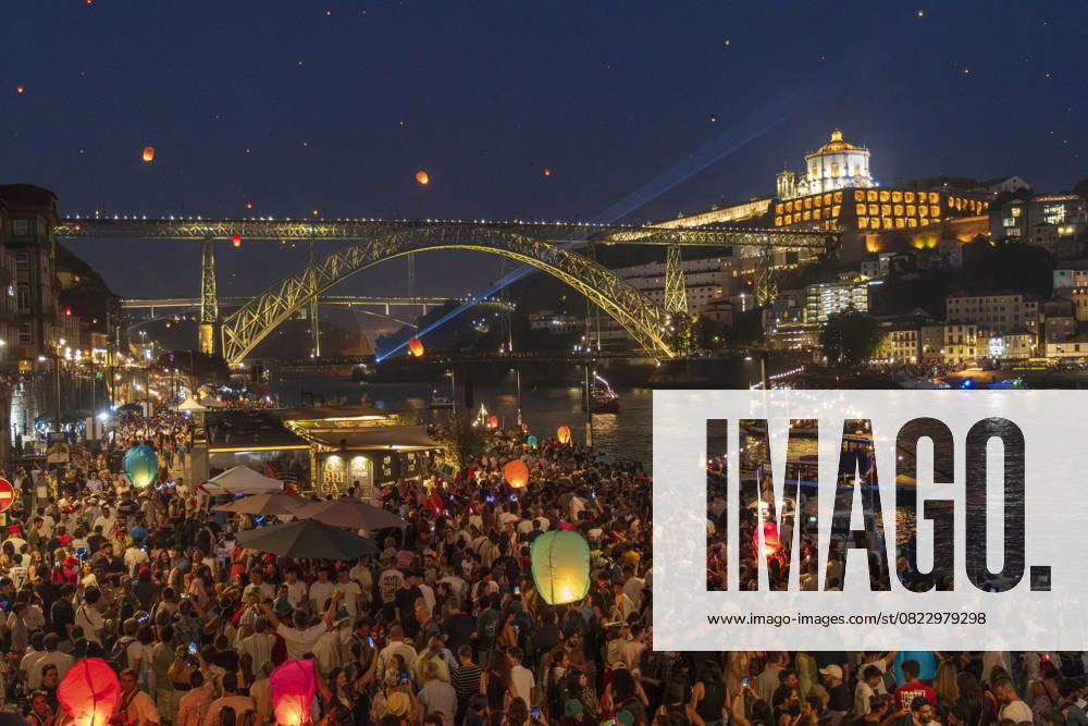 Porto at night in a blaze of light: during the traditional Sao Joao festival, the city is transformed into a colourful sea of lanterns, fireworks and cheerful people - a living testimony to Portuguese festival culture. Portugal GMS19434
