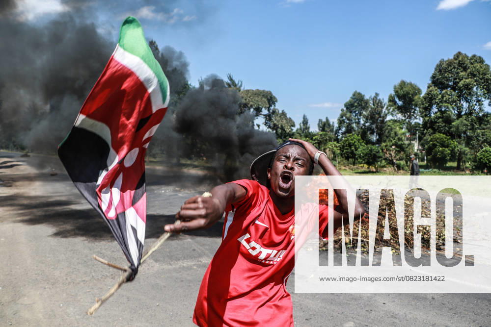 Nakuru joins nationwide demonstrations in Nakuru, Kenya - 25 Jun 2025 A protester waves a flag while chanting slogans during the nationwide demonstration that marks one year since the historic June 25, 2024 protests against bad governance. Nakuru Kenya