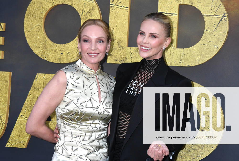LOS ANGELES, CA - JUNE 25: Uma Thurman and Charlize Theron at the Netflix premiere of The Old Guard 2 at the Netflix Tudum Theater in Los Angeles, California on June 25, 2025.
