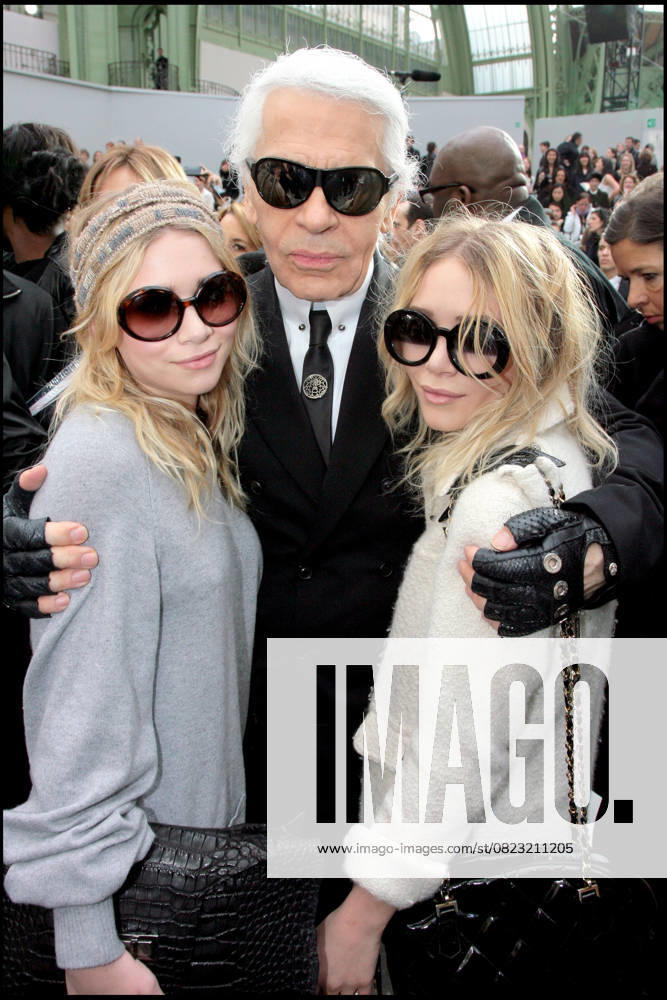 KARL LAGERFELD, MARY KATE AND ASHLEY OLSEN PEOPLE AT THE CHANEL FASHION SHOW READY TO WEAR FALL WINTER 2008 2009 AT THE GRAND PALAIS IN PARIS PEOPLE AT CHANEL READY TO WEAR FALL WINTER 2008 2009 FASHION SHOW AT THE GRAND PALAIS IN PARIS Paris France