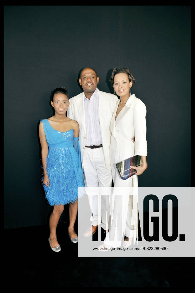 FOREST WHITAKER, HIS DAUGHTER AMBER AND HIS PEOPLE AT GEORGES CHAKRA FASHION SHOW FALL WINTER 2008 2009 IN PARIS PEOPLE ATTENDING GEORGES CHAKRA FASHION SHOW IN PARIS France