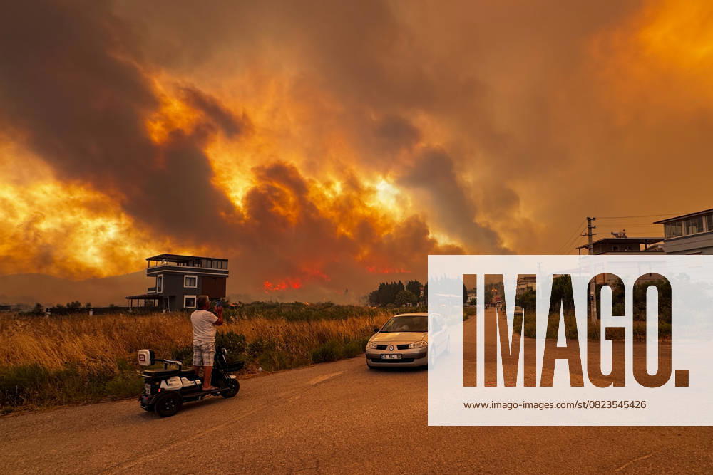 Wildfires in Turkiye s Izmir IZMIR, TURKIYE - JUNE 29: Flames rise from forest area after a wildfire broke out in Seferihisar district, Izmir, Turkiye on June 29, 2025. The forest fire that broke out on the borders of Menderes and Seferihisar districts of Izmir is being intervened by air and land. Teams continue to work to bring the fire under control in the region where strong winds are effective. Lokman Ilhan Anadolu Izmir Turkey. Editorial use only. Please get in touch for any other usage.