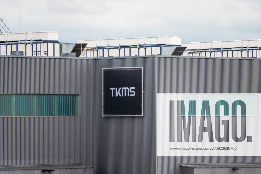 TKMS formerly TyssenKrupp Marinesystems in Kiel, the new halls for the construction of modern submarines Logo of TKMS