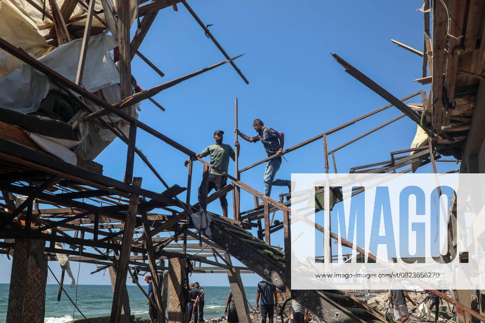 (250630) -- GAZA, June 30, 2025 -- People gather at a beachfront cafe destroyed in an Israeli airstrike in Gaza City, on June 30, 2025. The death toll from an Israeli airstrike on a beachfront cafe in Gaza City has risen to 34, up from an earlier report of 21, Palestinian medical and security sources said on Monday. (Photo by Xinhua) MIDEAST-GAZA CITY-BEACHFRONT CAFE-ISRAEL-AIRSTRIKE RizekxAbdeljawad