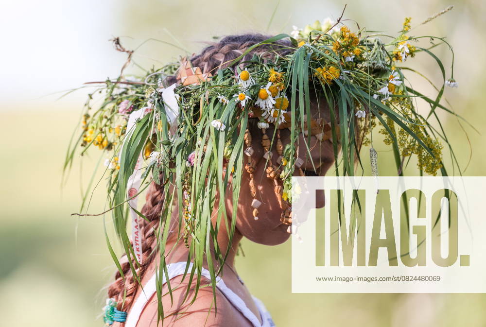 RUSSIA, MOSCOW REGION - JULY 5, 2025: A girl wears a flower crown during festivities marking Ivan Kupala Day, a pagan summer solstice celebration, at the Vasilkovoye Ozero holiday park Russia - ZUMAt113 20250705_zaa_t113_464